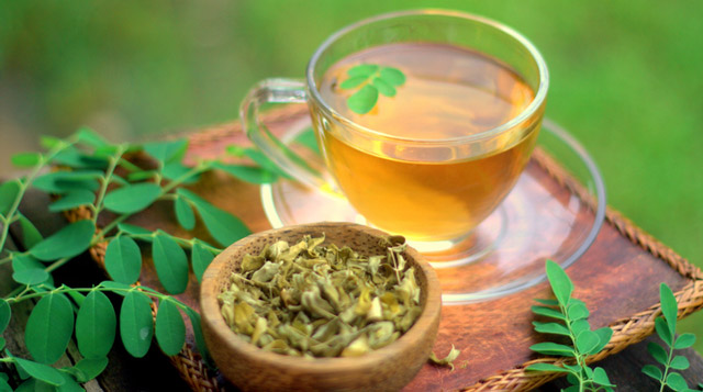 Moringa tea cup and moringa tea leaves