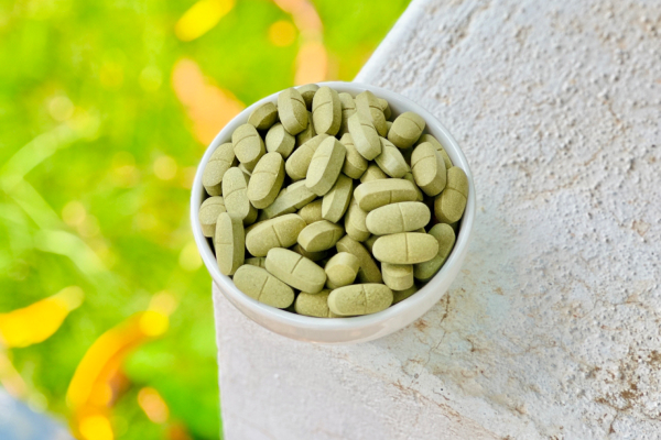 Moringa tablets in a bowl